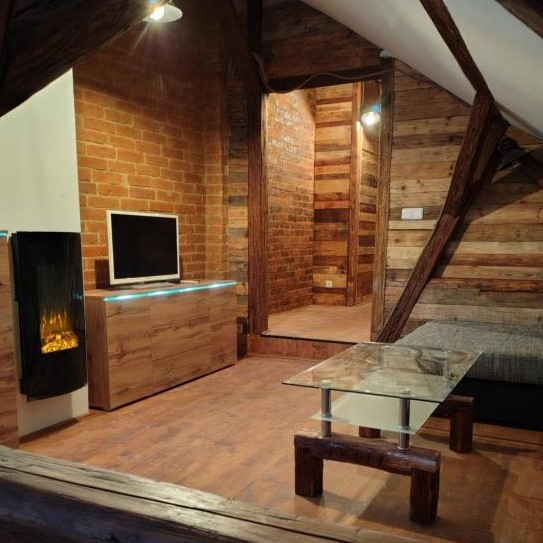 Podkrovní wellness apartmán blízko centra